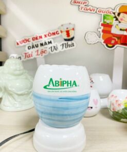 ĐÈN TINH DẦU IN LOGO ABIPHA